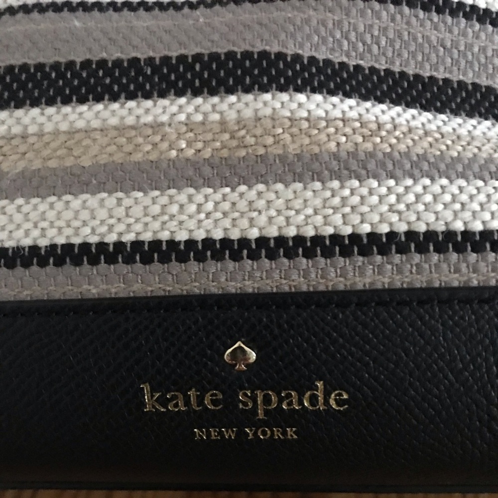 Like new AUTHENTIC Kate Spade cloth satchel with leather trim.